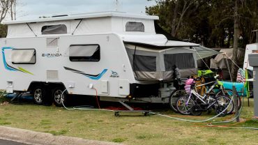 Caravan with outdoor setup at Big Lap Bible event in Australia.